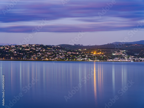 Knysna town lights reflection on the lagoon after sunset in South Africa