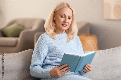Beautiful mature woman read...