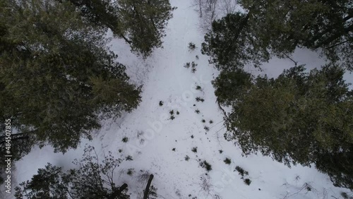 Top-down view of people snowshoeing in the mountains