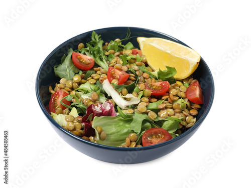 Bowl of delicious salad with lentils and vegetables isolated on white