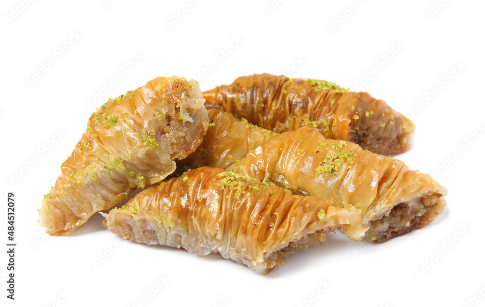 Delicious baklava with pistachios on white background
