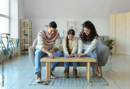 Happy parents with little d...