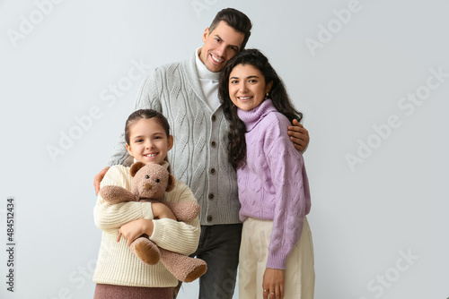 Little girl with toy and he...