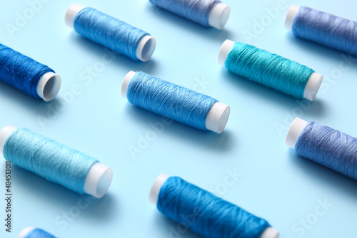 Assorted blue thread spools...