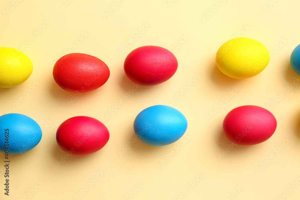Multicolored Easter eggs on light background