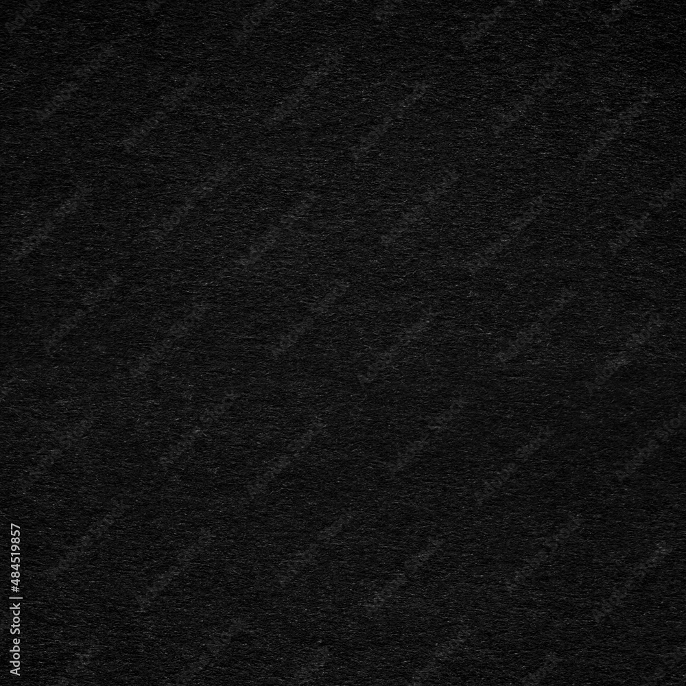 Black paper or cardboard texture as background Black paper or cardboard texture as background