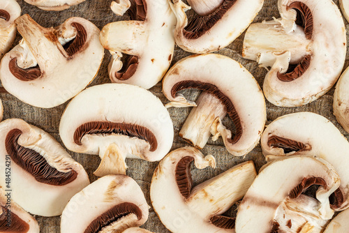 Flat lay composition with fresh champignon mushrooms close-up