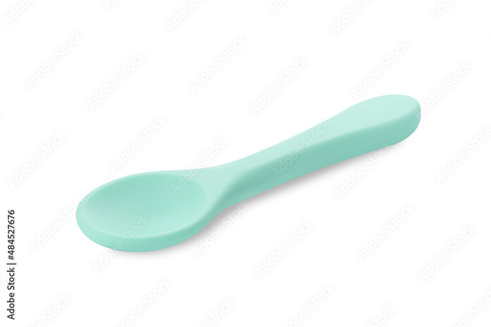 Plastic spoon isolated on white. Serving baby food Plastic spoon isolated on white. Serving baby food