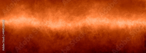 Orange background autumn fall colors gradient smoky paint texture with bright center and mottled red border in panoramic banner header image design
