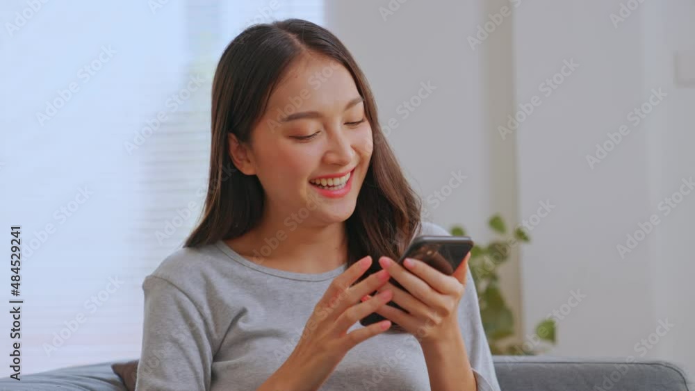 Smiling charming young business woman professional talking on phone sit at home , happy female customer make mobile call confirming online website shopping order delivery concept Smiling charming young business woman professional talking on phone sit at home , happy female customer make mobile call confirming online website shopping order delivery concept