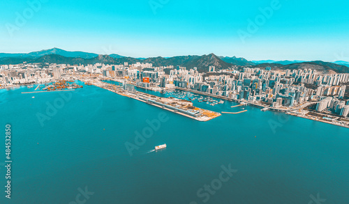 Panoramic aerial view of Hong Kong city in Orange and Teal  color tone