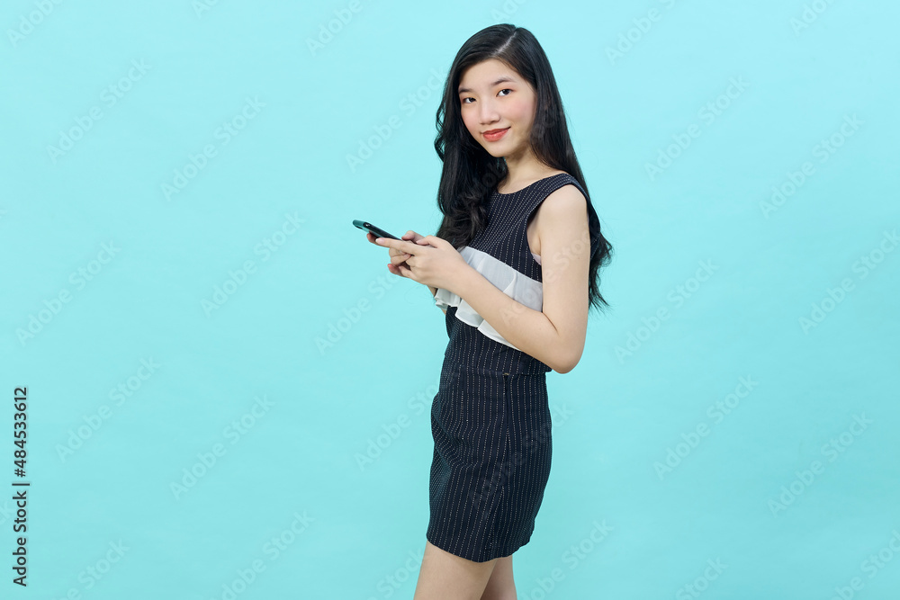 Portrait of a happy asian businesswoman using mobile phone Portrait of a happy asian businesswoman using mobile phone