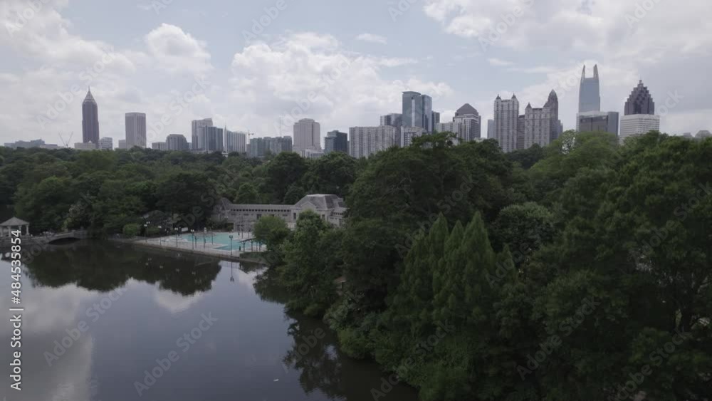 Atlanta Georgia Rising Shot from Reflective Pond to Reveal City Skyline Day Atlanta Georgia Rising Shot from Reflective Pond to Reveal City Skyline Day
