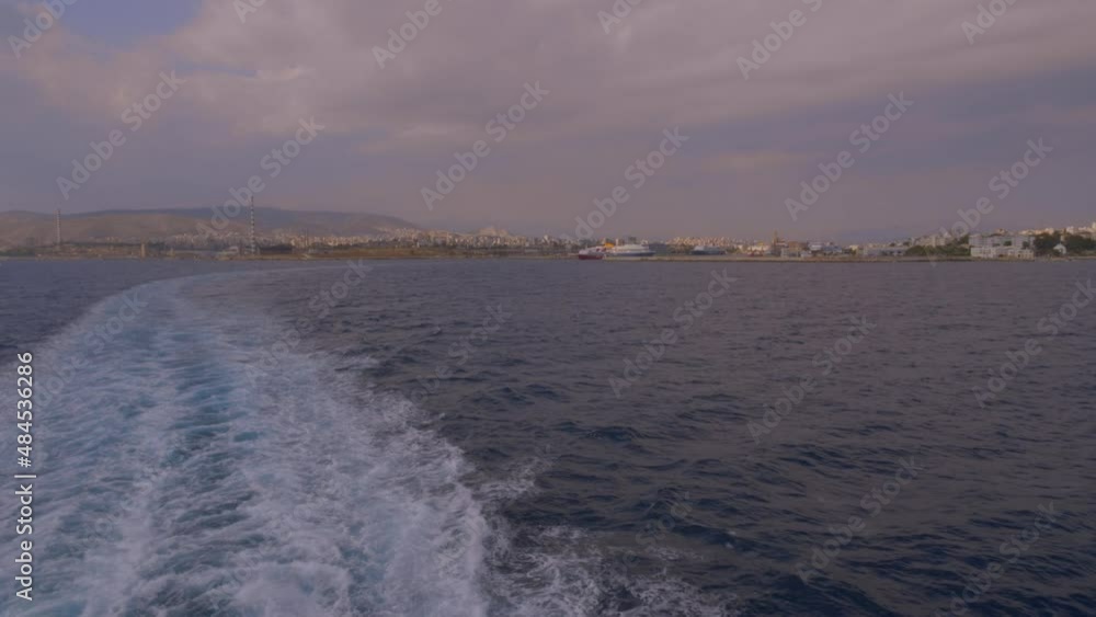 The ship left the Piraeus port, wid angle shot of Anthens from the sea The ship left the Piraeus port, wid angle shot of Anthens from the sea
