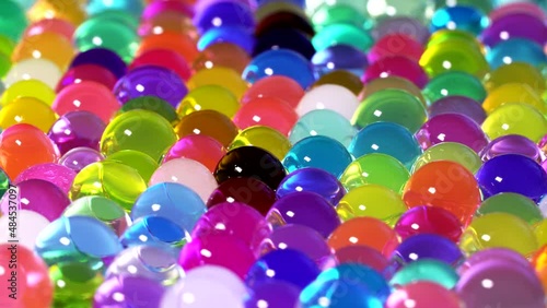 Colorful hydrogel balls rotation background