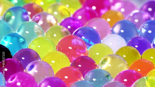 Colorful hydrogel balls rotation background