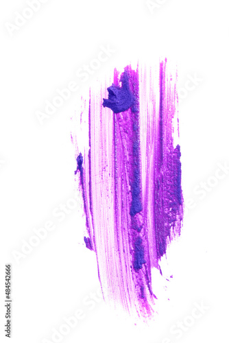 A vertical smear of lipstick stands out against a white background. The lilac color of the cosmetic product. Creamy texture of makeup. High quality photo