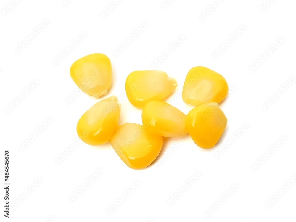 Fototapeta premium Boiled yellow corn, yellow sweet corn kernels placed on a white background.