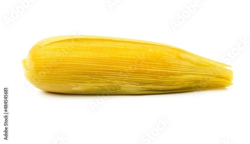 Boiled yellow corn, yellow sweet corn kernels placed on a white background.