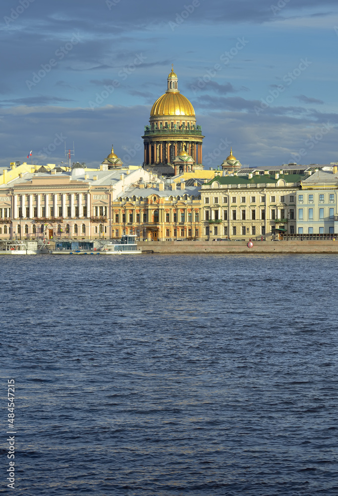 English embankment of the Neva river. Dome of St. Isaac's Cathedral