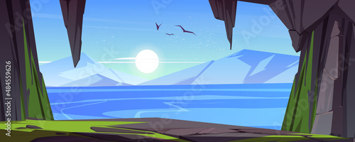 Cave in rock or stone arch with view to lake and mountains on horizon. Vector cartoon illustration of summer landscape of stone cavern entrance, sea, flying birds and sun in sky