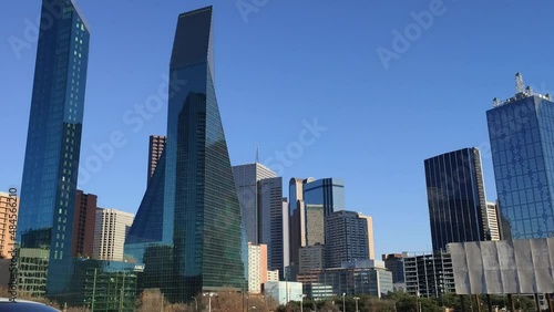 Dallas, Texas, USA - CIRCA 2022: Driving Car in Dallas Downtown Cityscape Skyline Bridge Road