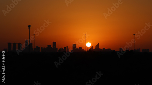 View of abu dhabi skyline during sunset from an island