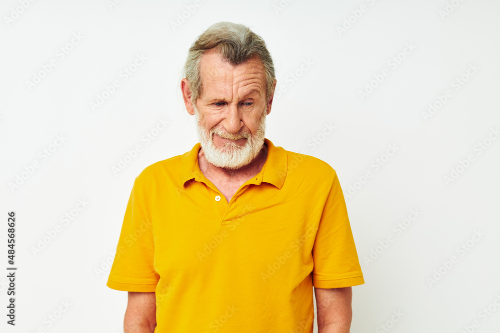 Portrait elderly man with a gray beard emotion gestures hands isolated background Portrait elderly man with a gray beard emotion gestures hands isolated background
