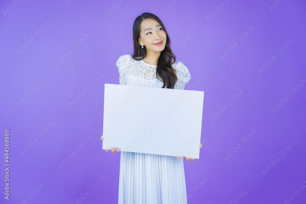 Portrait beautiful young asian woman with empty white billboard Portrait beautiful young asian woman with empty white billboard