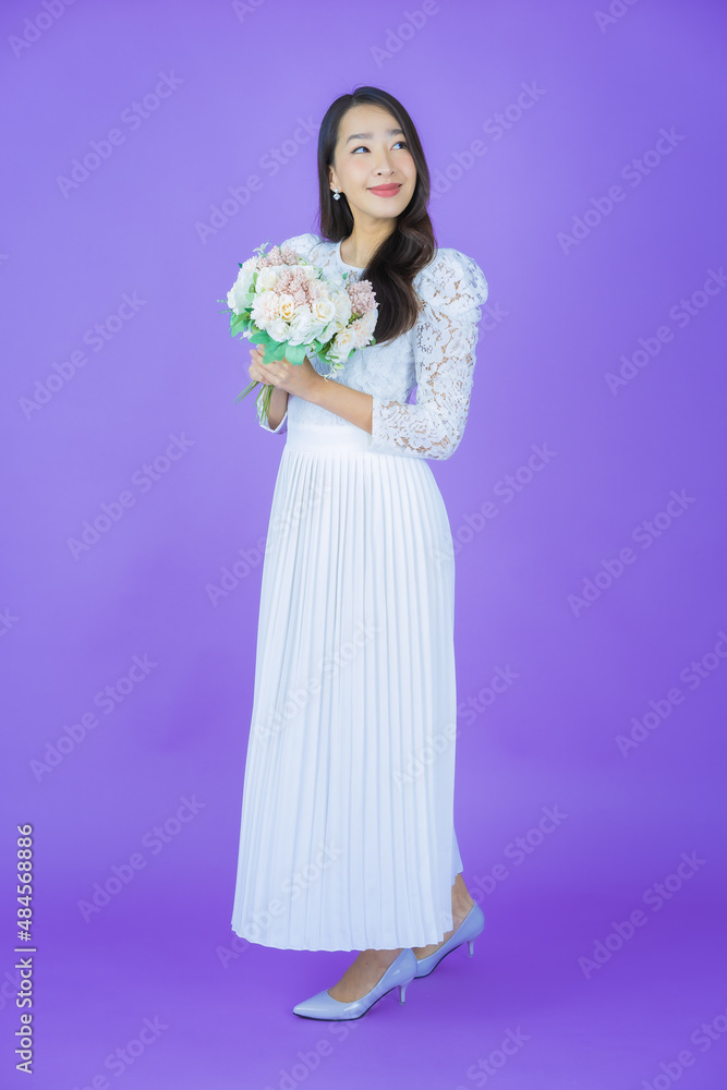 Portrait beautiful young asian woman smile with flower Portrait beautiful young asian woman smile with flower