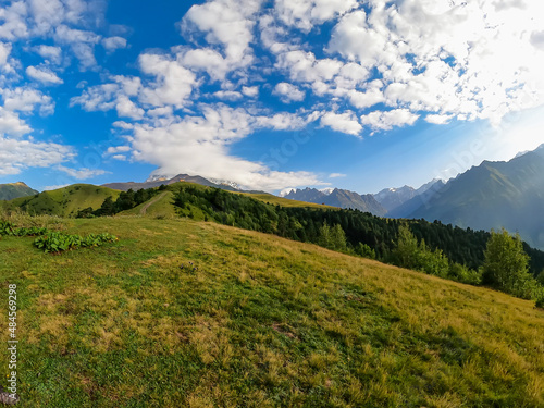 Amazing view from the Tskahazagari peak on the Svaneti mountain peaks near Mestia in the Greater Caucasus Mountain Range  Upper Svaneti Country of Georgia.Hiking trail to the Koruldi Lakes.Cottage hut