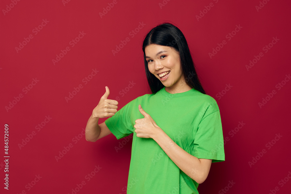 woman green t-shirt gestures with his hands isolated background unaltered woman green t-shirt gestures with his hands isolated background unaltered