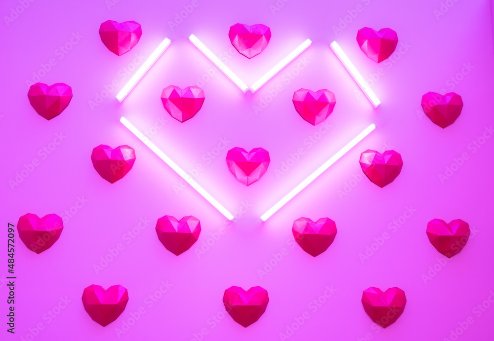 Abstract background pink background with geometric purple hearts and heart shaped lamps shining. Holiday background for Valentines Day. Minimal style.