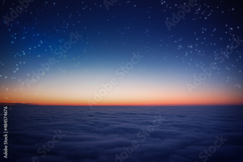 Starry sky above the clouds. Wonderful night landscape. © maykal