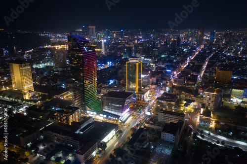 Wallpaper Mural Top View of Building in a City - Aerial view Skyscrapers flying by drone of Phnom Penh city with downtown , riverside and sunset Torontodigital.ca