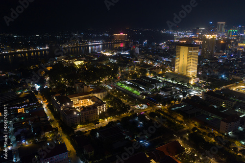 Top View of Building in a City - Aerial view Skyscrapers flying by drone of Phnom Penh city with downtown , riverside and sunset