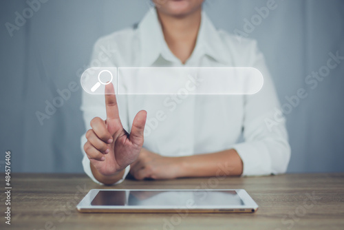 Search technology, search engine optimization, women tapping on virtual images to search for information, use of web search functions, SEO