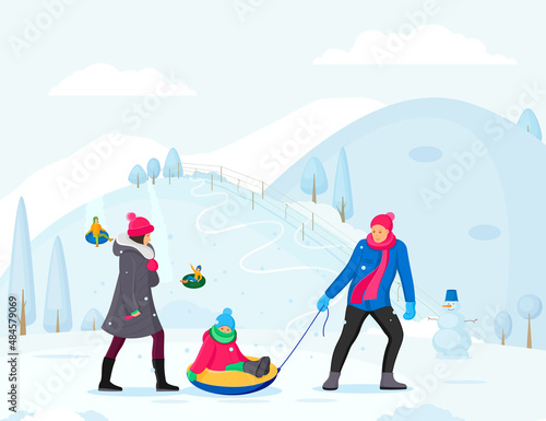 Family winter activity. Family winter vacation with kids riding on snow tubing. Kids having fun enjoy ride.