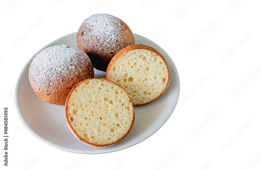Lithuanian donuts on a plate on a white background Lithuanian donuts on a plate on a white background