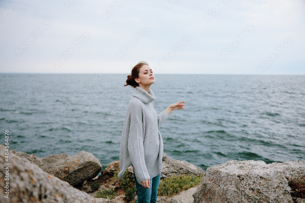 pretty woman nature rocks coast landscape Ocean female relaxing