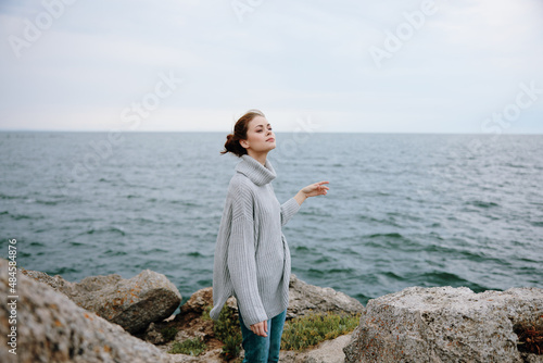 pretty woman nature rocks coast landscape Ocean female relaxing © SHOTPRIME STUDIO