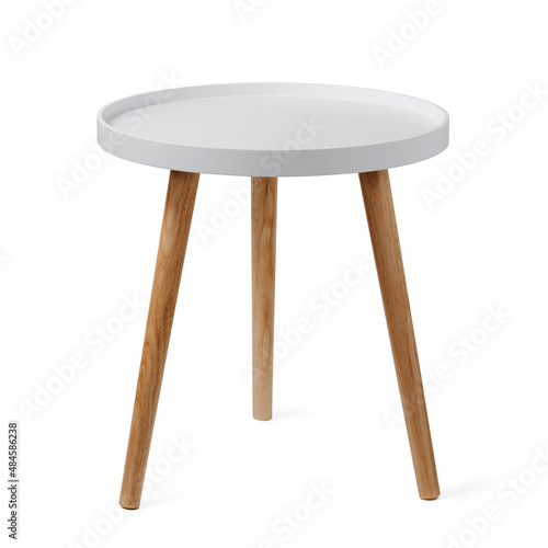 Round coffee table or end table isolated on white background with clipping path. Small round white table with 3 legs on white background.