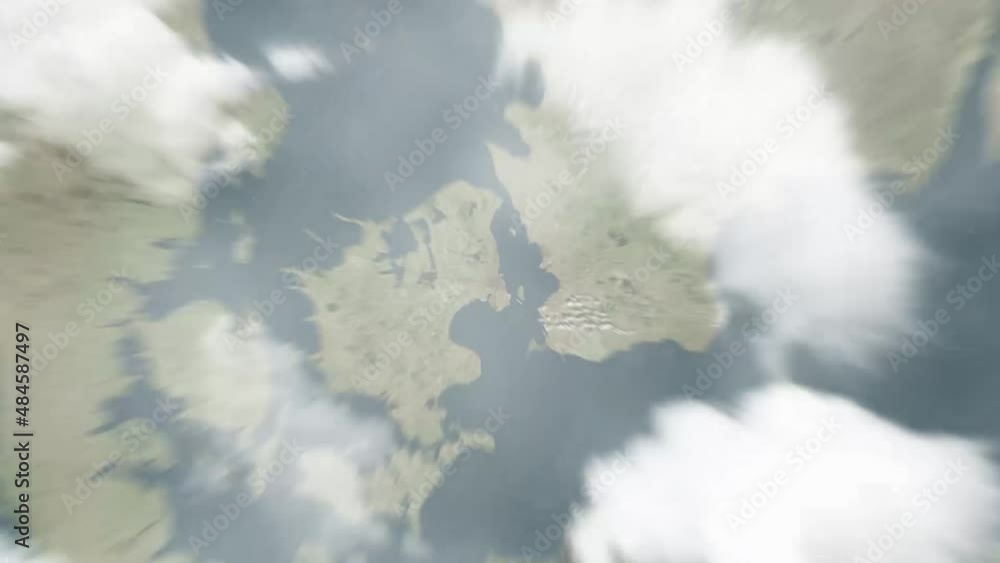 Earth zoom in from outer space to city. Zooming on Denmark, Copenhagen. The animation continues by zoom out through clouds and atmosphere into space. View of the Earth at night. Images from NASA.