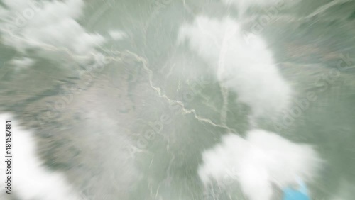 Earth zoom in from outer space to city. Zooming on Bangladesh, Rajshahi. The animation continues by zoom out through clouds and atmosphere into space. View of the Earth at night. Images from NASA. 4K photo
