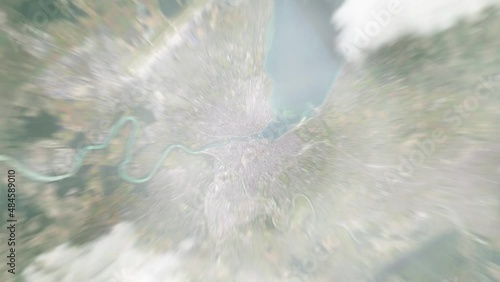 Earth zoom in from outer space to city. Zooming on Geneva, Switzerland. The animation continues by zoom out through clouds and atmosphere into space. View of the Earth at night. Images from NASA. 4K