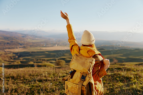 woman traveler admiring the landscape mountains nature relaxation