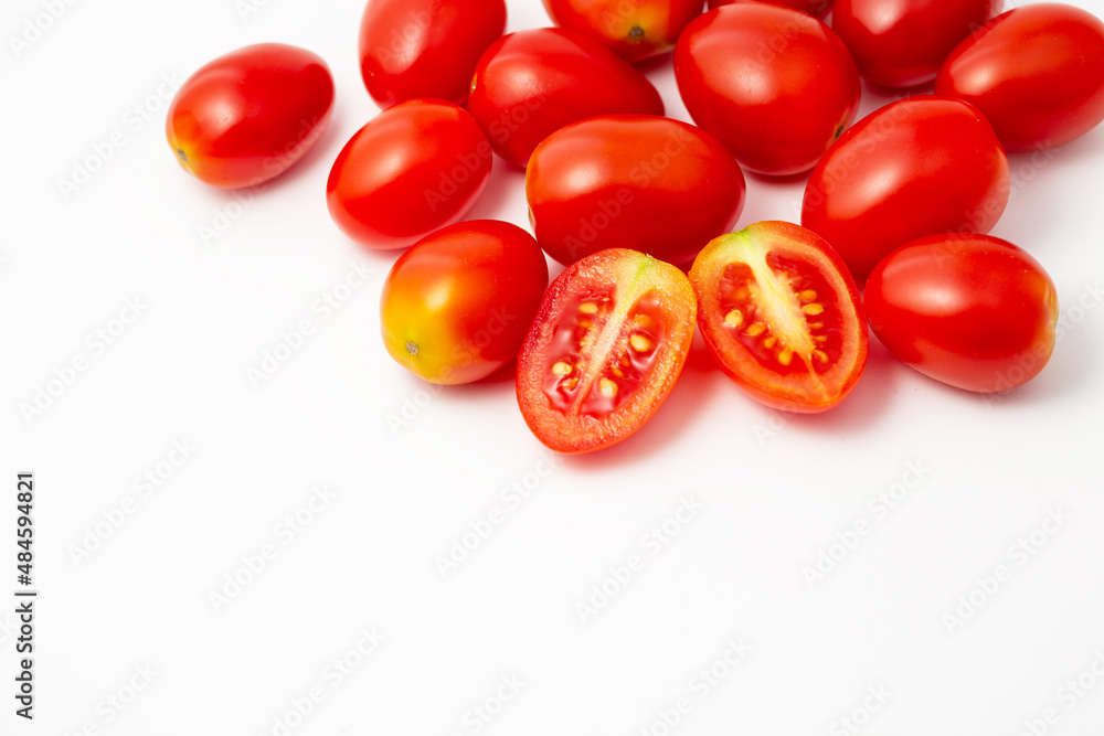 Fresh cherry tomatoes, grape tomatoes vegeatable or fruit sliced isolated in white background. Fresh cherry tomatoes, grape tomatoes vegeatable or fruit sliced isolated in white background.