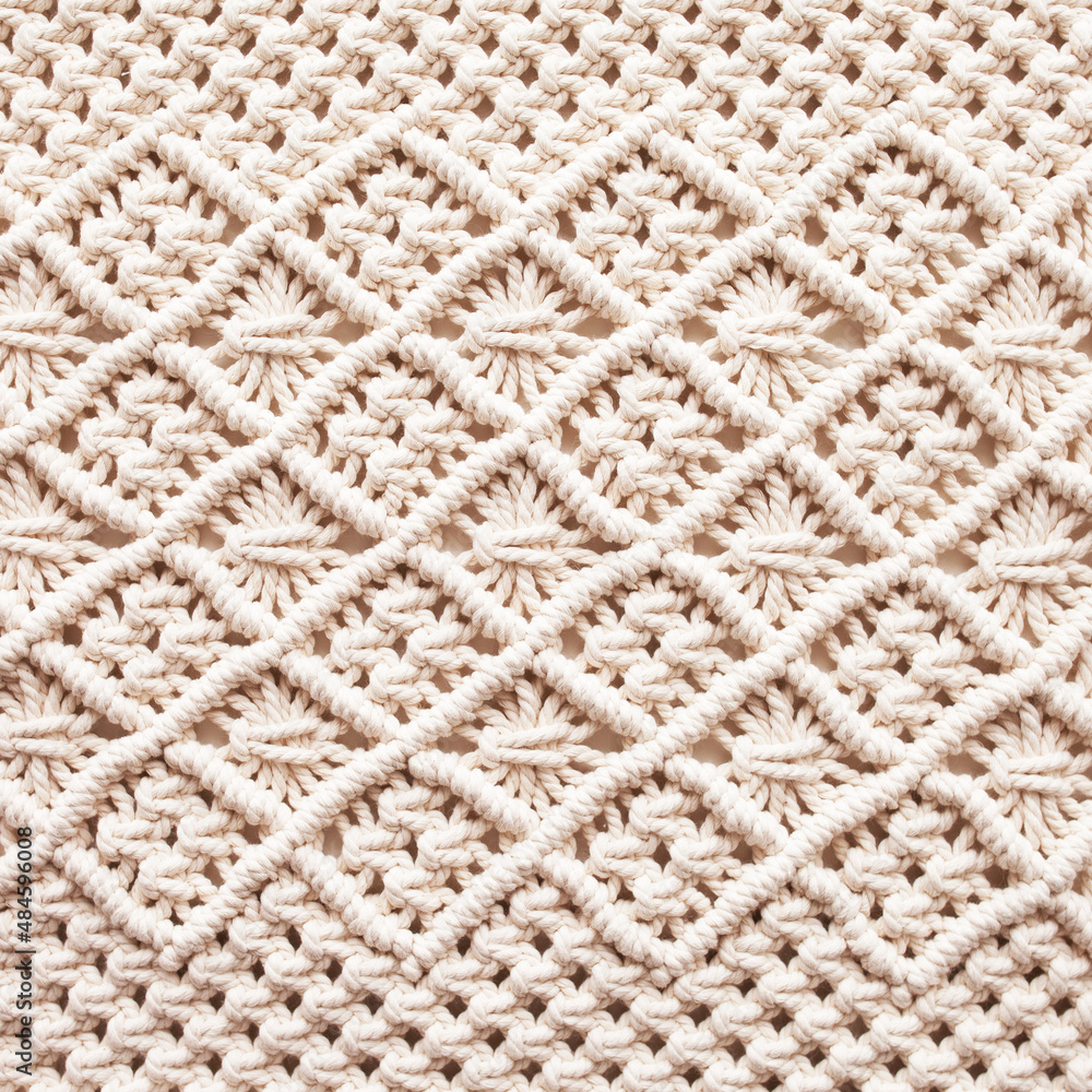 Handmade macrame. Macrame braiding and cotton threads. Female hobby. ECO friendly modern knitting natural decoration concept Handmade macrame. Macrame braiding and cotton threads. Female hobby. ECO friendly modern knitting natural decoration concept
