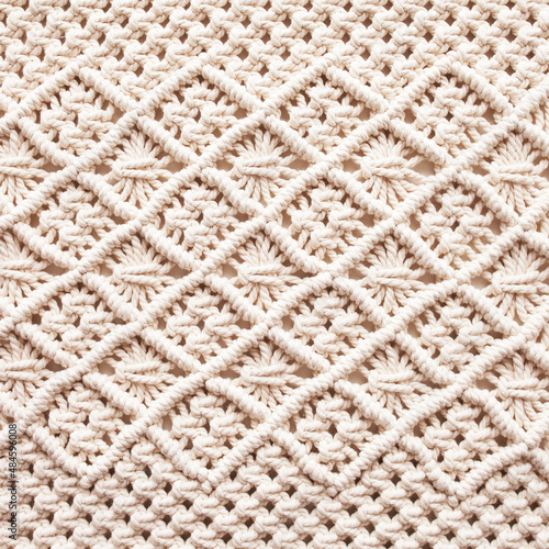 Handmade macrame. Macrame braiding and cotton threads. Female hobby. ECO friendly modern knitting natural decoration concept