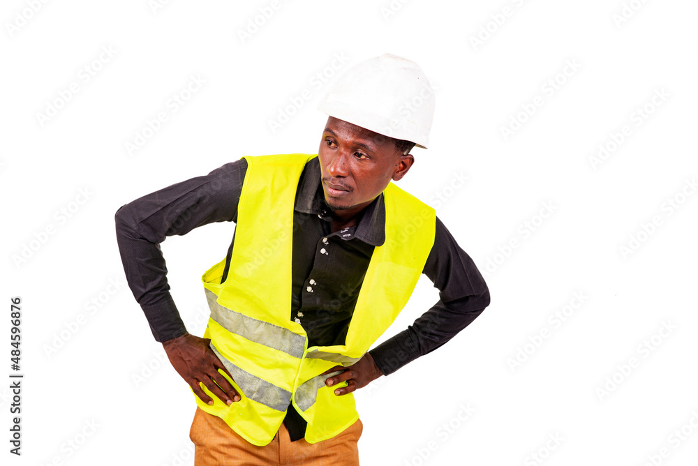 young man construction engineer looking aside. young man construction engineer looking aside.